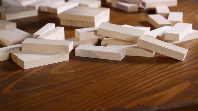 The wooden blocks on the table. .Jenga game. selective focus