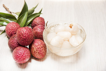 Lychee casing in the cup and fruit.