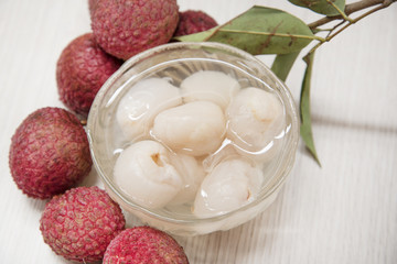 Lychee casing in the cup and fruit.