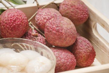 fresh lychees in a wooden box