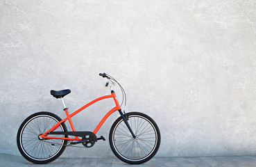 Obraz na płótnie Canvas City bike against the wall with shiny silvery metallic plaster