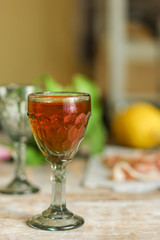 drink in a glass on a wooden table (alcohol) - drink berry cuisine.  Food background