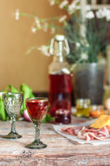 drink in a glass on a wooden table (alcohol) - drink berry cuisine.  Food background