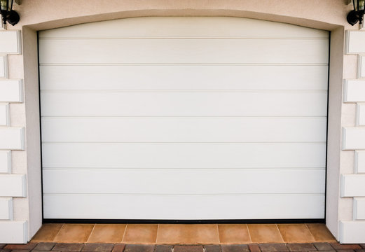 white automatic garage door pvc