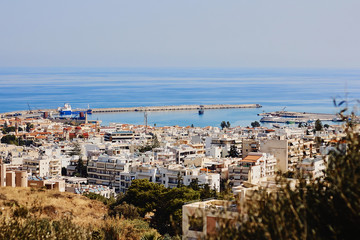 Obraz premium Top view of the Greek city Rethymno, harbor and Aegean Sea, Crete, Greece