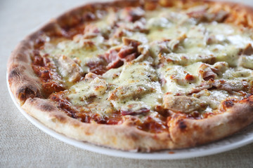 Pizza ham bacon with cheese and tomato sauce