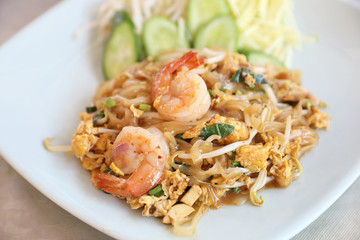 Shrimp pad thai noodles with shrimps on top , Thai food