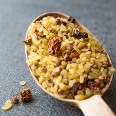 Raw Bulgur Rice with Buckwheat in Wooden Spoon / Bulghur for Pilav or Pilaf