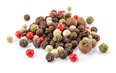 Black, red, green, white and allspice peppercorns isolated on white background. Heap of spice. Mix...