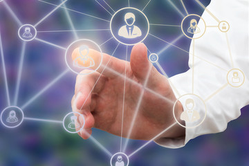hand of a a businessman touching technology interface with contact icon