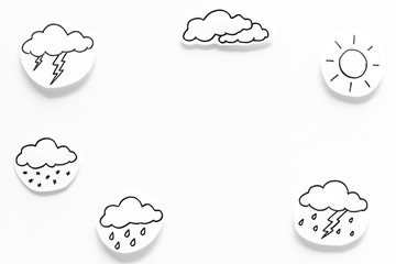 Modern weather icons set on white background top view copy space