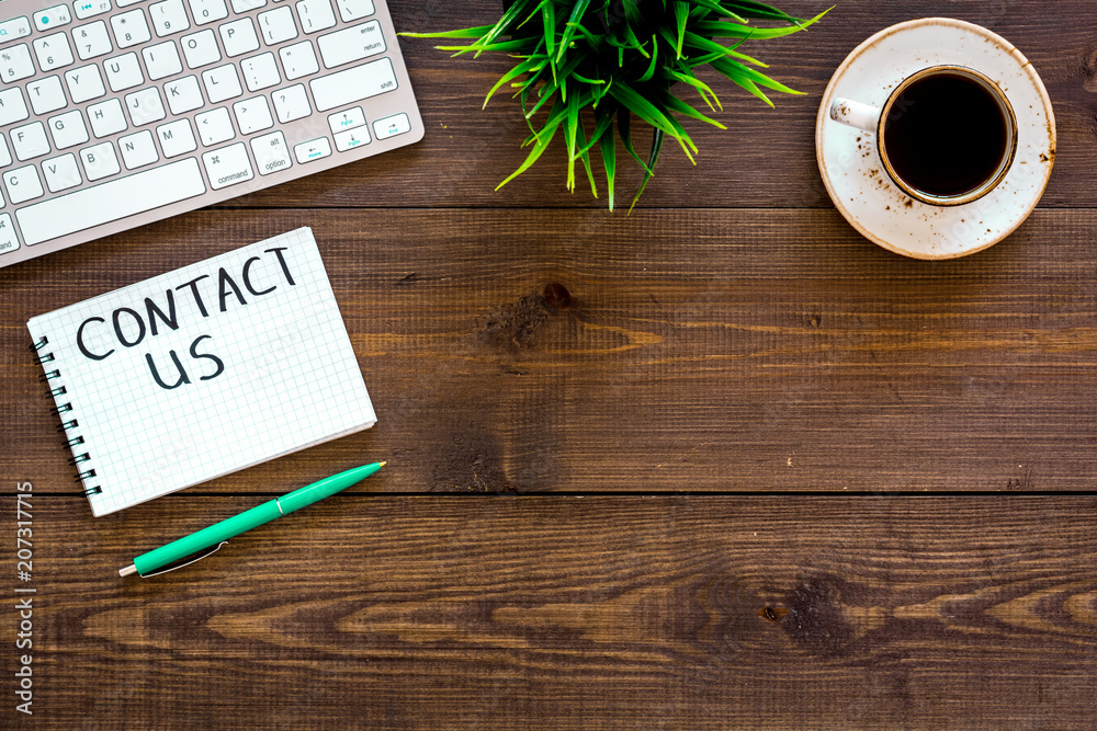 Poster template for contacts, background for contact information. lettering contact us in notebook on offic