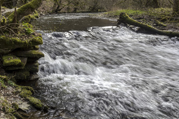 a small waterfall on a river