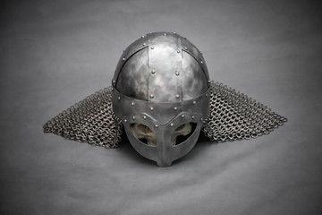 Skull in a Viking helmet, on a gray background