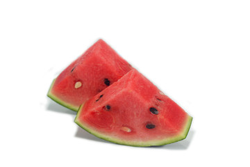 Watermelon slices cut into 3 slices isolated on white background