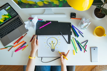 woman designer working at home. workplace. ideas
