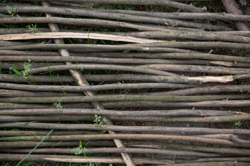 Close up of rattan on blue sky. Closeup of weaving rattan. Wallpaper of vine weaving wall.