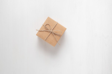 Fototapeta na wymiar gift box tied with string on a white background