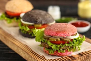 burgers on a slate plate  - fast food (sandwich) - cuisine.  Food background