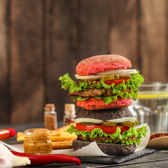 burgers on a slate plate  - fast food (sandwich) - cuisine.  Food background