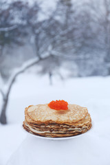 ruddy pancakes and red caviar