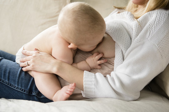 Mother breastfeeding baby