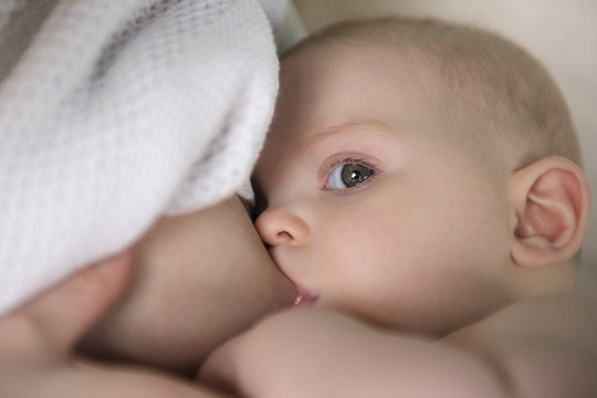 Mother breastfeeding baby