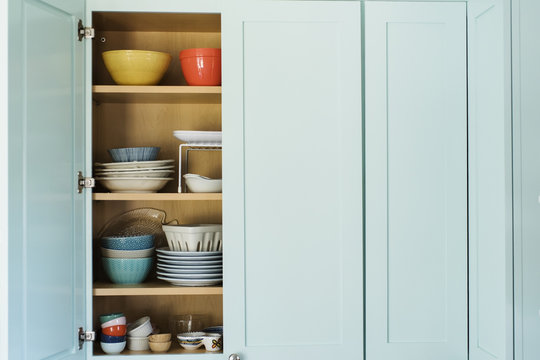 Dishes In Cupboard