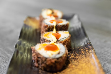 Sushi, a typical Japanese food prepared with a base of rice and various raw fish such as tuna, salmon, shrimp and sea bream. To which is added, according to the variants,.