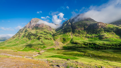 Wonderful mountains of Glencoe at sunrise in Scotland © shaiith