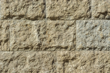 Fragment of a stone wall.