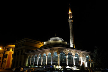 Fototapeta na wymiar The Et'hem Bey Mosque at night on Skanderbeg Square, Tirana, Albania.