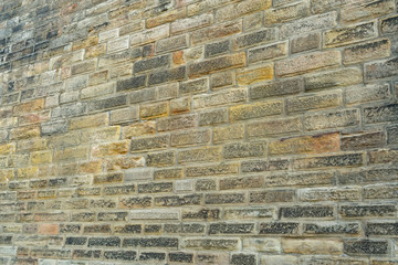 old vintage brick city wall in perspective