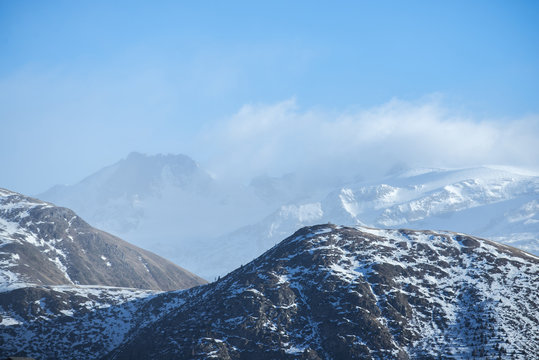 Cloudy blue morning dky over the mountains, France