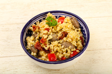 Bulgur with chicken hearts