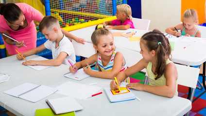 Fototapeta premium cheerful kids at school lesson .