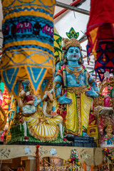 Fototapeta na wymiar Colorful market with Kali statue