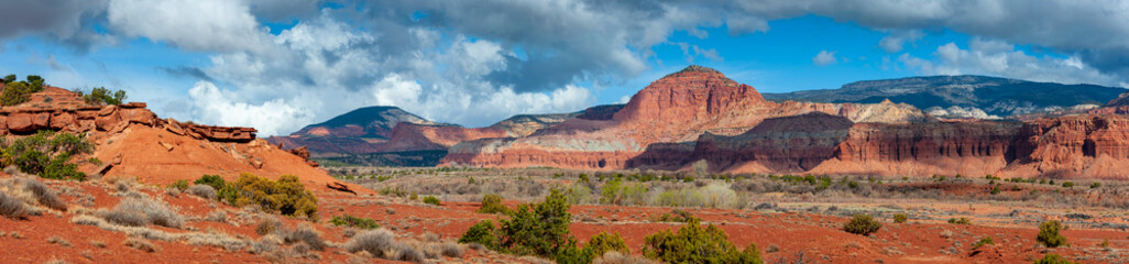Cathedral Valley, Capitol Reef National Park, Utah. Cathedral Valley, in the northern area of Capitol Reef National Park, has some of the most stunning views around. A rain squall seen on the horizon - obrazy, fototapety, plakaty