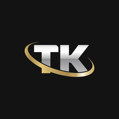 Initial letter TK, overlapping swoosh ring logo, silver gold color on black background