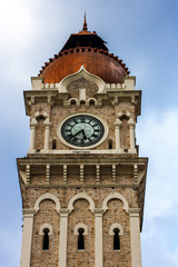 Clock tower Sultan Abdul Samad over cloudy sky