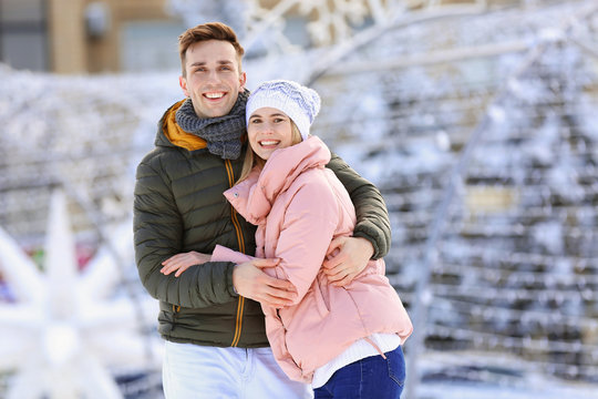 Portrait Of Happy Couple Outdoors On Winter Day