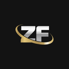 Initial letter ZF, overlapping swoosh ring logo, silver gold color on black background