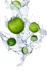  Splash of water and fruit on white background