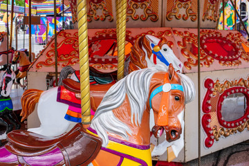 Closeup of carousel horses at the carnival