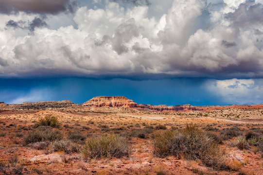 Cathedral Valley, Capitol Reef National Park, Utah. Cathedral Valley, in the northern area of Capitol Reef National Park, has some of the most stunning views around.A rain squall seen on the horizon. 