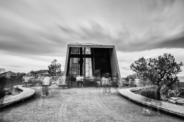 Black and white long exposure view of the Chapel of Holy Cross in Sedona, Arizona.