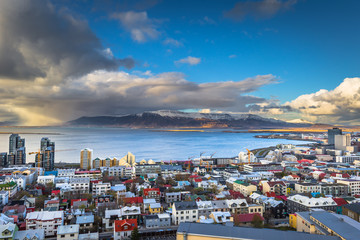 Reykjavik - May 01, 2018: Panoramic view of Reykjavik from the Hallgrimskirkja church, Iceland - obrazy, fototapety, plakaty