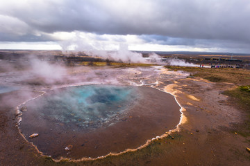 Geysir - May 03, 2018: Hot thermal water pool in the Geysir park, Iceland