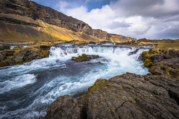 Icelandic wilderness - May 05, 2018: Beautiful waterfall in the wilderness of Iceland
