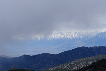 Rain and snow rolls in on the snow-capped White Mountains of Eastern California